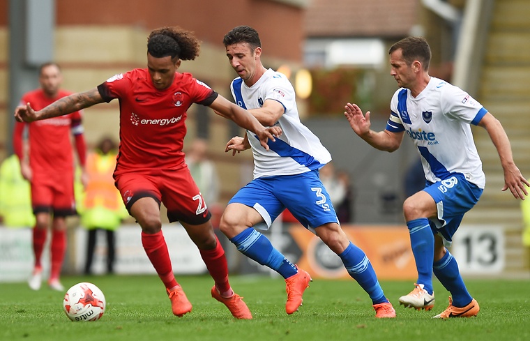 Leyton Orient's Sandro Semedo in action with Portsmouth's Enda Stevens and Michael Doyle.